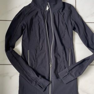 Used Lululemon black jacket with thumb holes. Longer length good used condition.